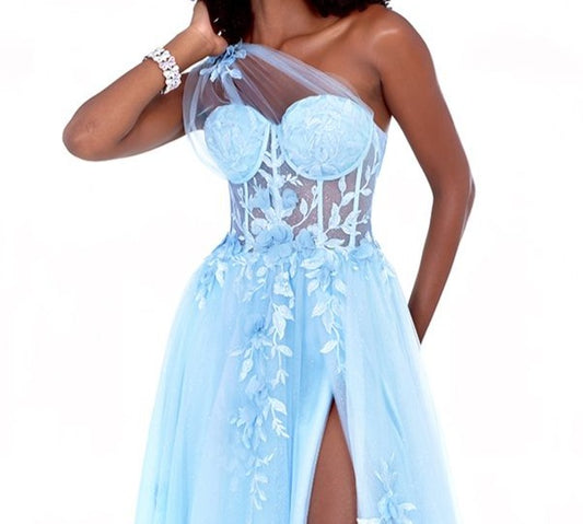 The Cecilia Couture 1516 is a modern and stylish formal dress with eye-catching features including a sheer lace shimmers, delicate one shoulder corset and an A-line tulle skirt. Perfect for special occasions and prom, this gorgeous dress will make you stand out. Slit skirt Sizes: 0-16 Colors: Lemon, Sky Blue