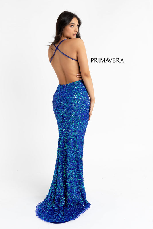 Primavera Couture 3291 Blue Exclusive Prom Dress Do you love Blue? Imagine wearing this blue exclusive Primavera Couture sequins long prom dress. It has a V neckline with spaghetti straps that crisscross in the open back. The long skirt on this evening gown has a left sided slit.
Blue sizes 2 , 4, 14
