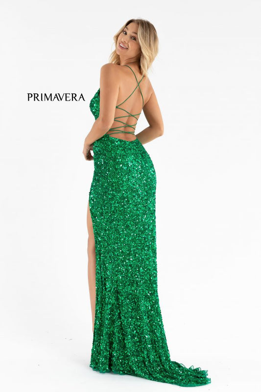 Primavera Couture 3791 Exclusive Prom Dress. This is an all sequins prom dress with a V neckline and spaghetti straps that lace up and tie in the open back. It has a wrap style side slit and a sweeping train. Colors: Emerald Sizes: 8