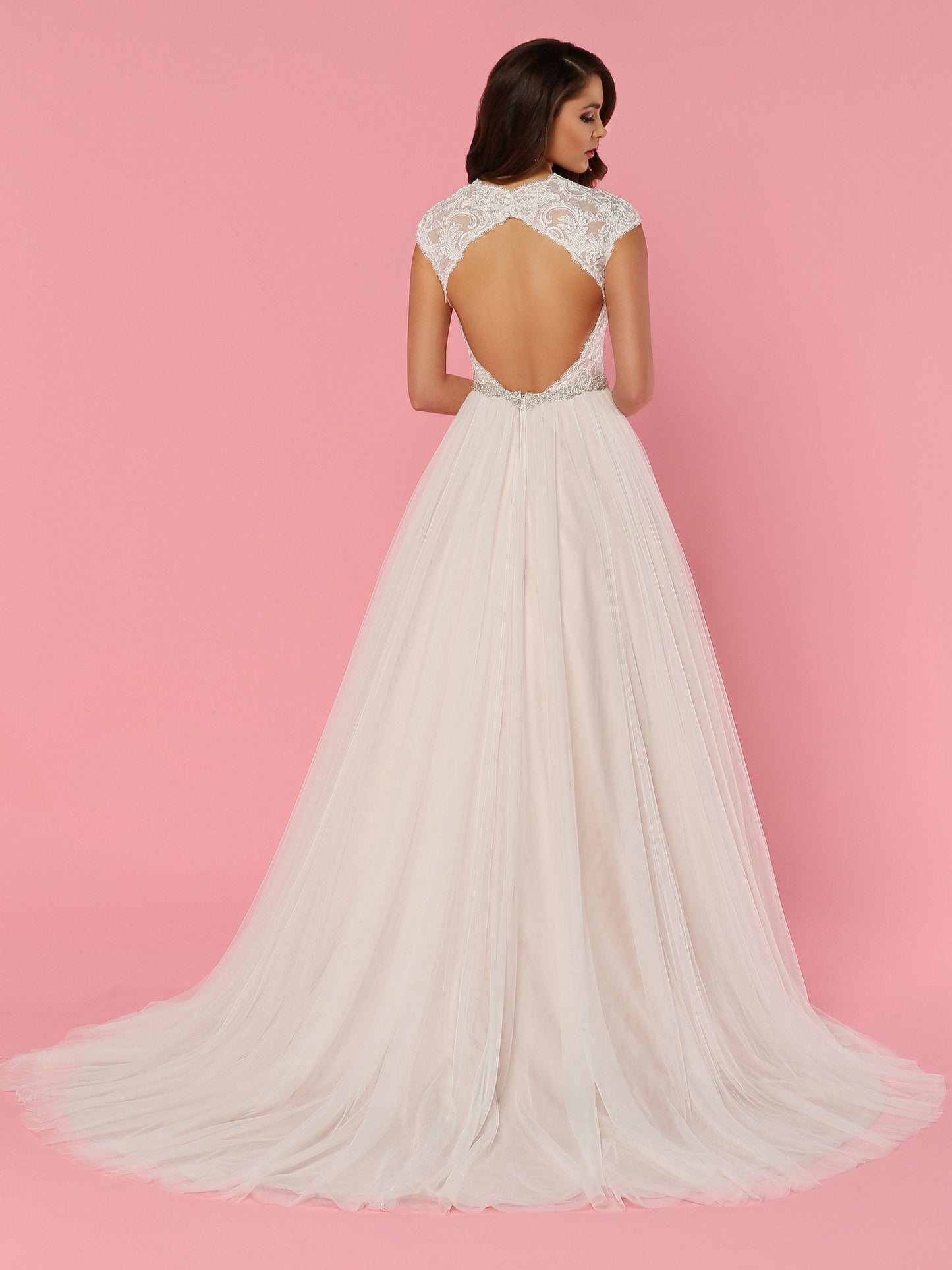 Davinci Bridal 50456 is a Stunning Lace & Tulle Ballgown wedding dress. Featuring an Eyelash Lace Bodice with a sweetheart neckline & Sheer cap sleeves. Open Keyhole Cutout back with sheer lace. Embellished attached Crystal Bridal belt with a lush soft tulle ballgown skirt and train Available for 1-2 Week Delivery!!! Available Sizes: 2,4,6,8,10,12,14,16,18,20 Available Colors: Ivory/Blush, Ivory/Ivory