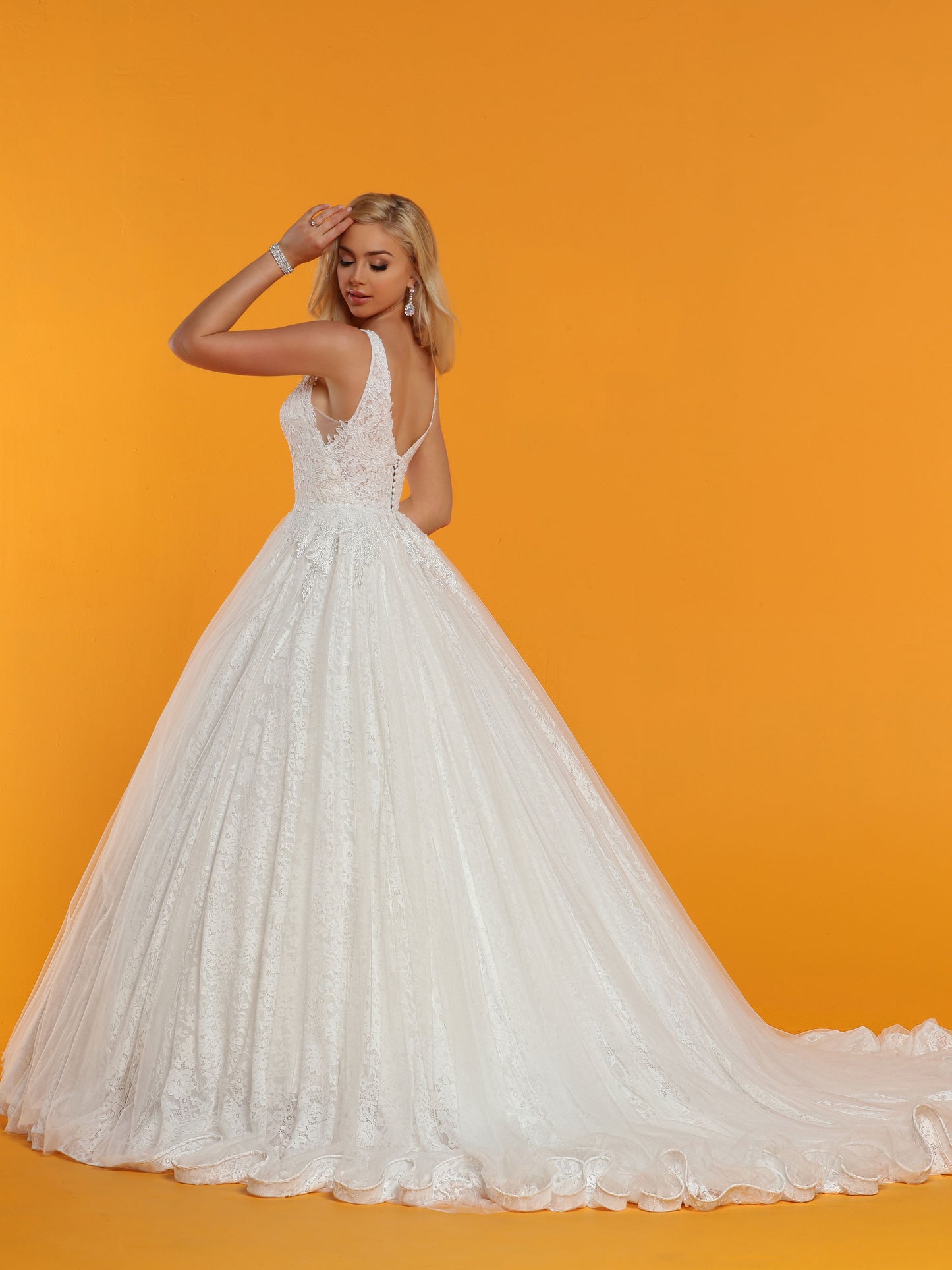 Davinci Bridal 50510 is a Tulle & Lace A Line Ballgown Wedding Dress features a Floral Lace Bodice with V-Neckline, Sheer Lace Wideset Straps, Sheer Lace Back with Covered Buttons & Beaded Waistband. Scalloped Lace Fit & Flare Skirt finishes with a Chapel Train. Available for 1-2 Week Delivery!!! Available Sizes: 2,4,6,8,10,12,14,16,18,20