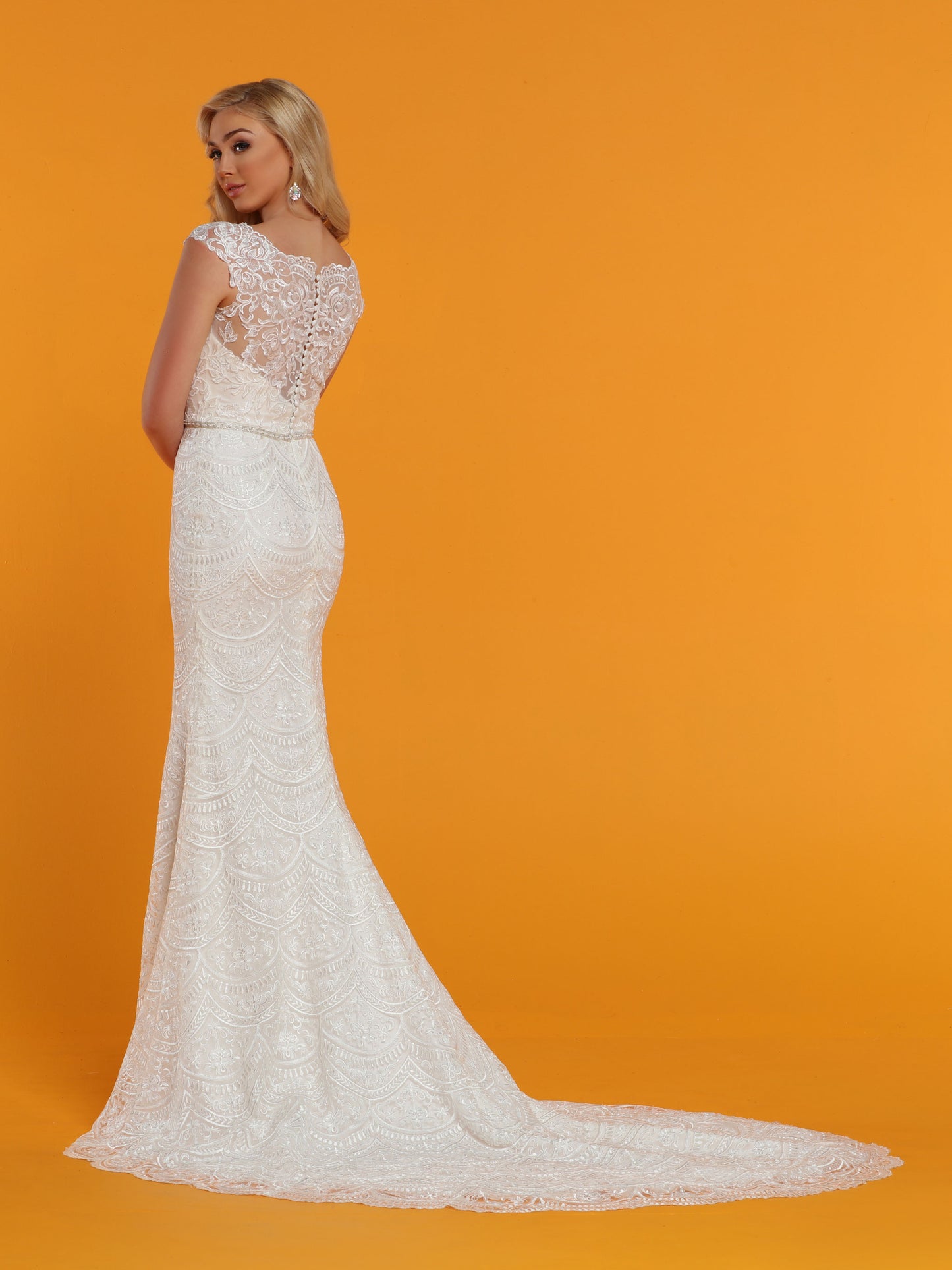 Davinci Bridal 50540 is a Long Fitted Mermaid Silhouette Wedding Dress. Featuring a Sweetheart illusion Sheer Lace V Neckline with sheer lace wide straps leading to a sheer lace Illusion Back. Detailed crystal bridal belt along the waistline. Eyelash lace edge along hem and train. Available for 1-2 Week Delivery!!! Available Sizes: 2,4,6,8,10,12,14,16,18,20 Available Colors: Ivory