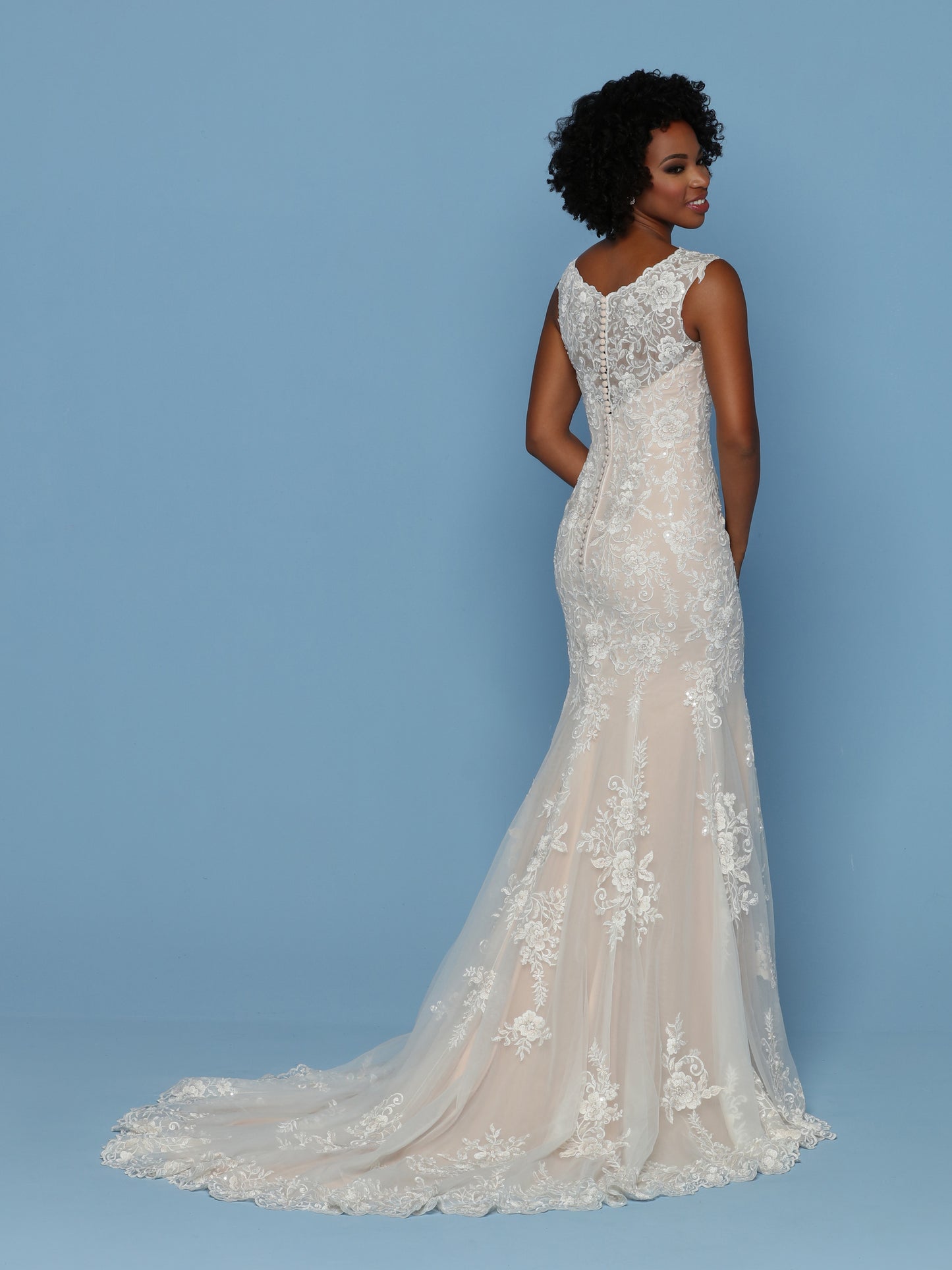 Davinci Bridal 50542 is a fitted Mermaid Wedding dress with beaded lace & Tulle. Features a lace edge V Neck with thick straps leading to a sheer lace illusion back. Buttons line the back seam. full lush trumpet skirt with a detailed lace edge along hem & train. Available for 1-2 Week Delivery!!! Available Sizes: 2,4,6,8,10,12,14,16,18,20 Available Colors: Ivory/Ivory, Ivory/Rose