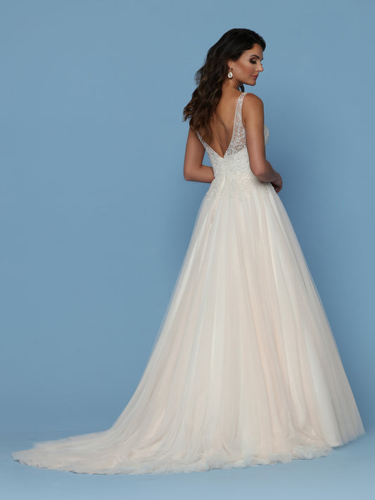 Davinci Bridal 50544 is a Beautiful Lush Soft Tulle A Line Ball Gown with a Hand Embellished Bodice cascading into to tulle skirt. Sweetheart Neckline with a sheer Illusion V Neck and straps leading around to an open V back. Available for 1-2 Week Delivery!!! Available Sizes: 2,4,6,8,10,12,14,16,18,20 Available Colors: Ivory/Blush, Ivory/Ivory