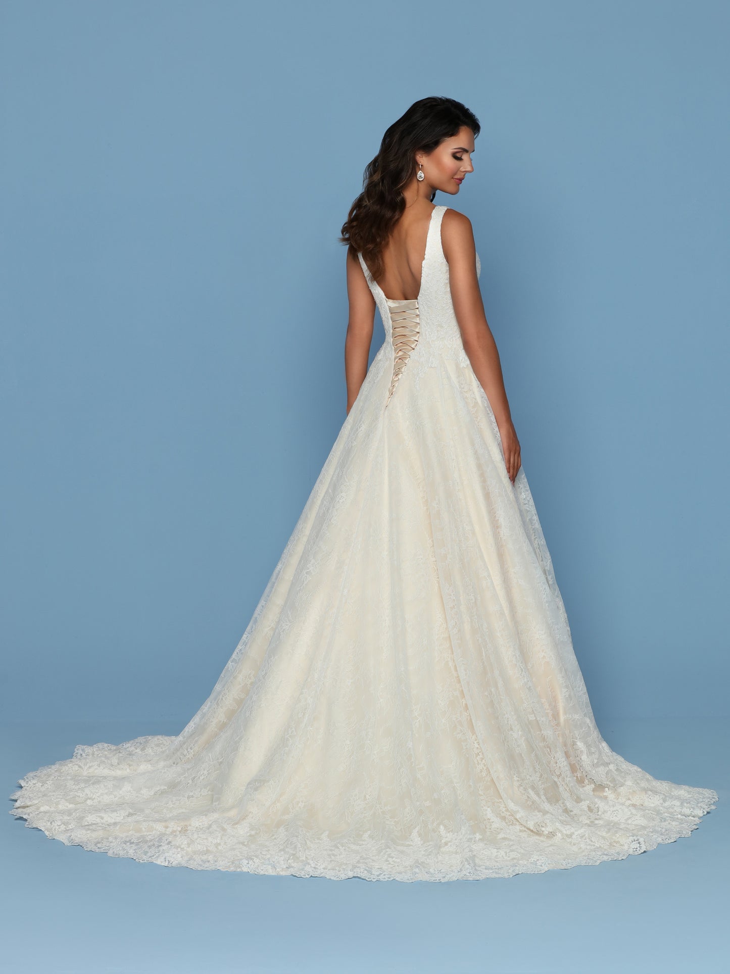 Davinci Bridal 50570 is an All over Lace A Line Ballgown Wedding Dress. Featuring a V Neckline with straps leading to an open back with a long line corset lace up closer. Full lace edged train in the back of the full skirt. Available for 1-2 Week Delivery!!! Available Sizes: 2,4,6,8,10,12,14,16,18,20 Available Colors: Ivory/Champagne, Ivory/Ivory