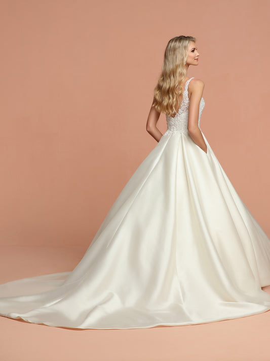 Davinci Bridal 50580 is a Sleek Mikado A-Line Ball Gown Wedding Dress with V-Neckline,Deep V-Back & Beaded Bodice. Full Mikado Ball Gown Skirt with Pleated Waist has Chapel Train. Hand Beading with Lace Applique, Pockets, Sequin Accent, V-Back, Zipper Available for 1-2 Week Delivery!!! Available Sizes: 2,4,6,8,10,12,14,16,18,20 Available Colors: Ivory Available Colors: Ivory, White