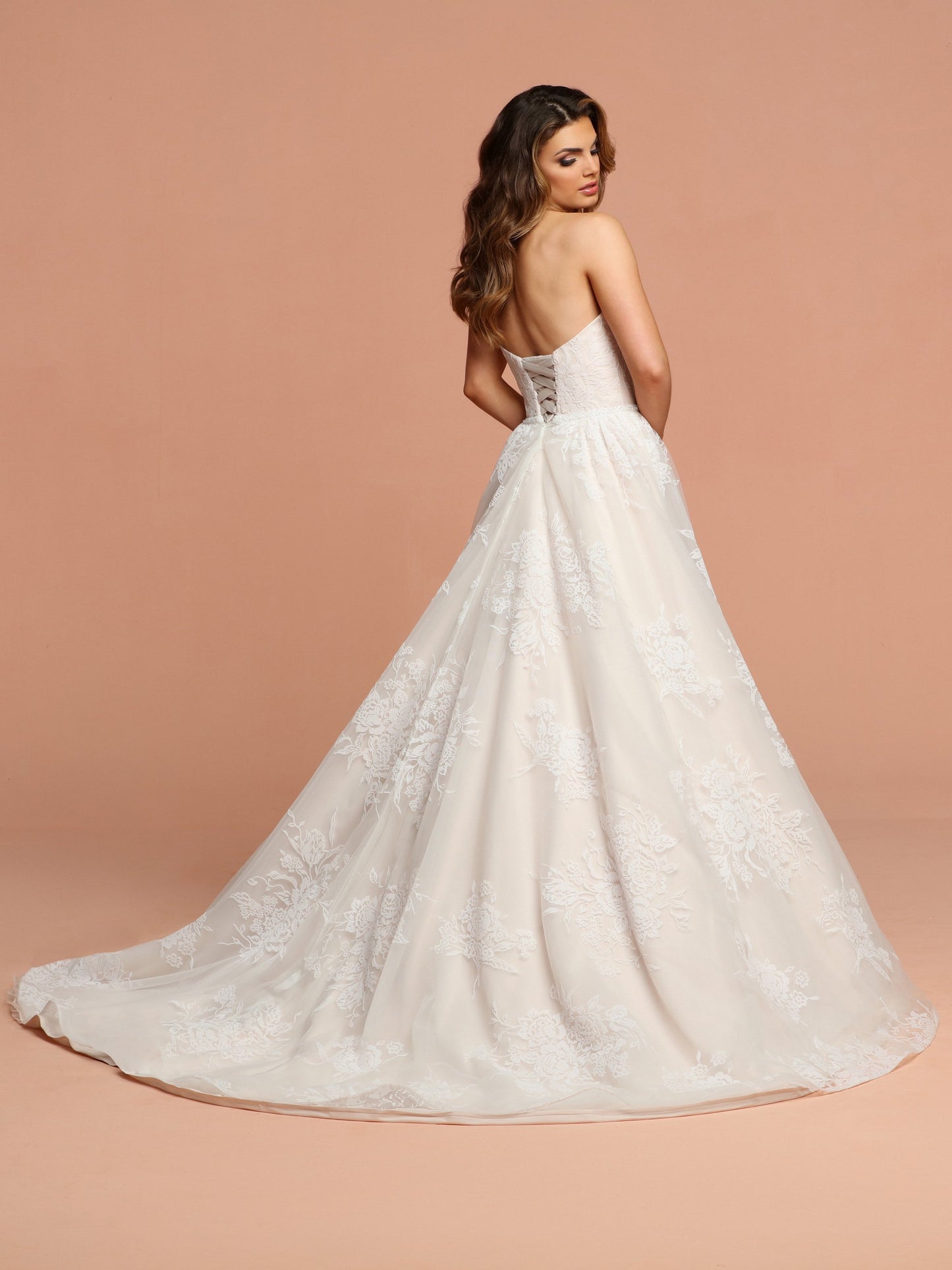 Davinci Bridal 50599 This flowing tulle gown has soft velvet like flowers throughout. The sweetheart strapless bodice has a beaded belt at the waist extending into a lace up back. Available for 1-2 Week Delivery!!! Available Sizes: 2,4,6,8,10,12,14,16,18,20 Available Colors: Ivory/Blush, Ivory/Ivory