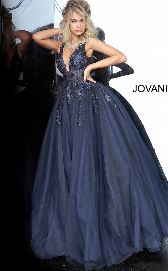 Jovani 55634 floral appliques v neckline prom dress ballgown Tulle ballgown, floor length, floral appliques, sheer sleeveless bodice, bra cups, v neckline and back. Available Colors: black, champagne, navy/black, off white/blush, off white/light blue, off white/off white, off white/yellow, off white/ lilac, red, teal Available Sizes: 00 - 24