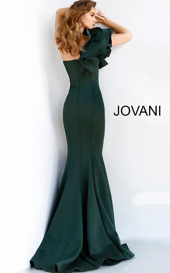 Jovani 63994 is a scuba mermaid Prom Dress, Pageant Gown & Formal Evening Wear gown. Details: Dark green scuba mermaid evening dress with one shoulder ruffle detail bodice and straight neckline, princess seams and floor length fitted skirt with flared mermaid end and train. Neckline: Straight Waistline: Natural Closure: Invisible back zipper Available Sizes: 00, 0, 2, 4, 6, 8, 10, 12, 14, 16, 18, 20, 22, 24 Available Colors: black, dark green, fuchsia, light-blue, navy, royal, tomato, white