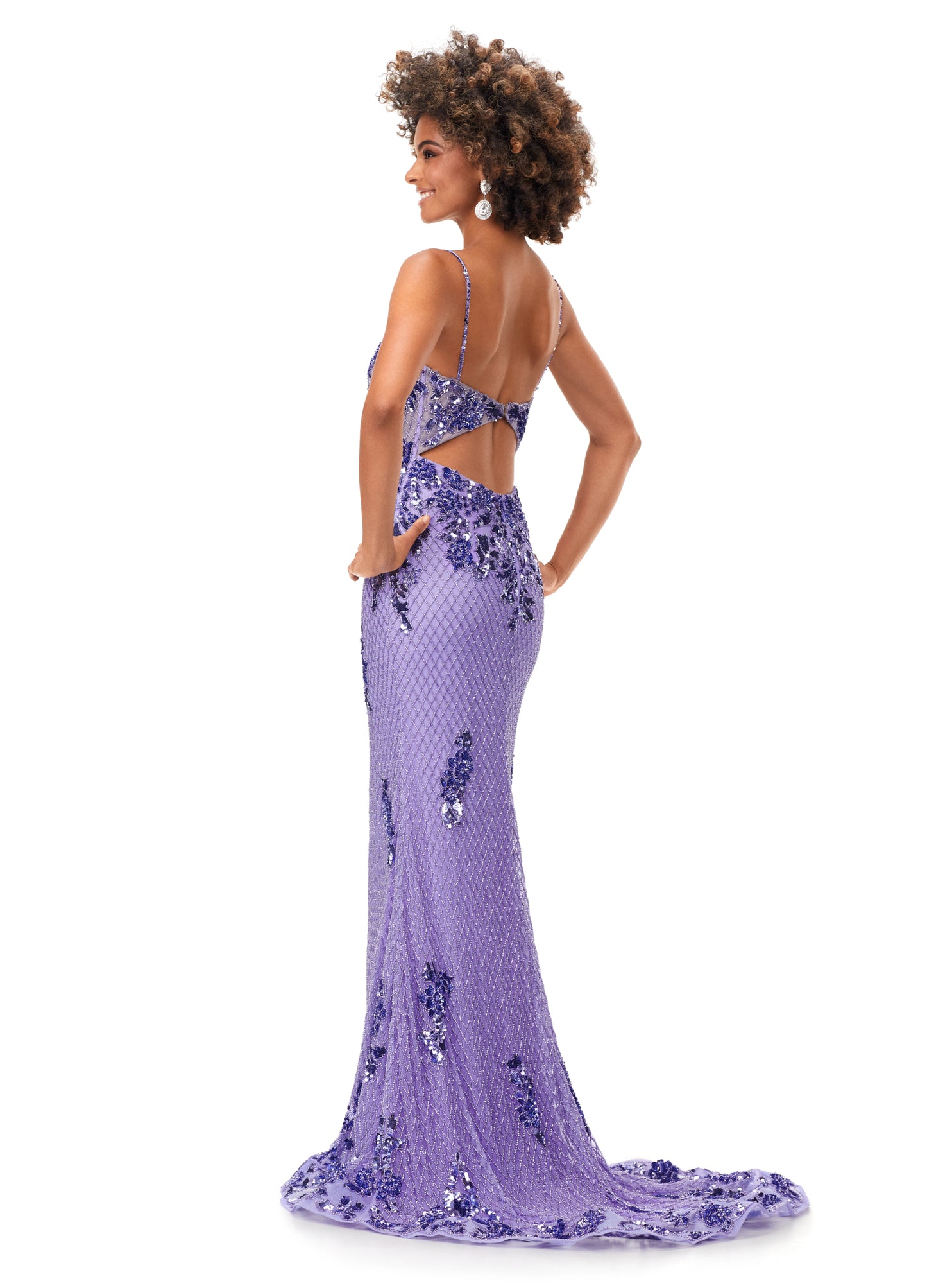 Ashley Lauren 11362 Fully Beaded Spaghetti Strap Prom Dress This spaghetti strap gown features a sweetheart neckline giving way to a sheer illusion bustier. The bustier is embellished with intricate sequin details that cascade down onto the skirt and hemline. The look is complete with a sweep train.