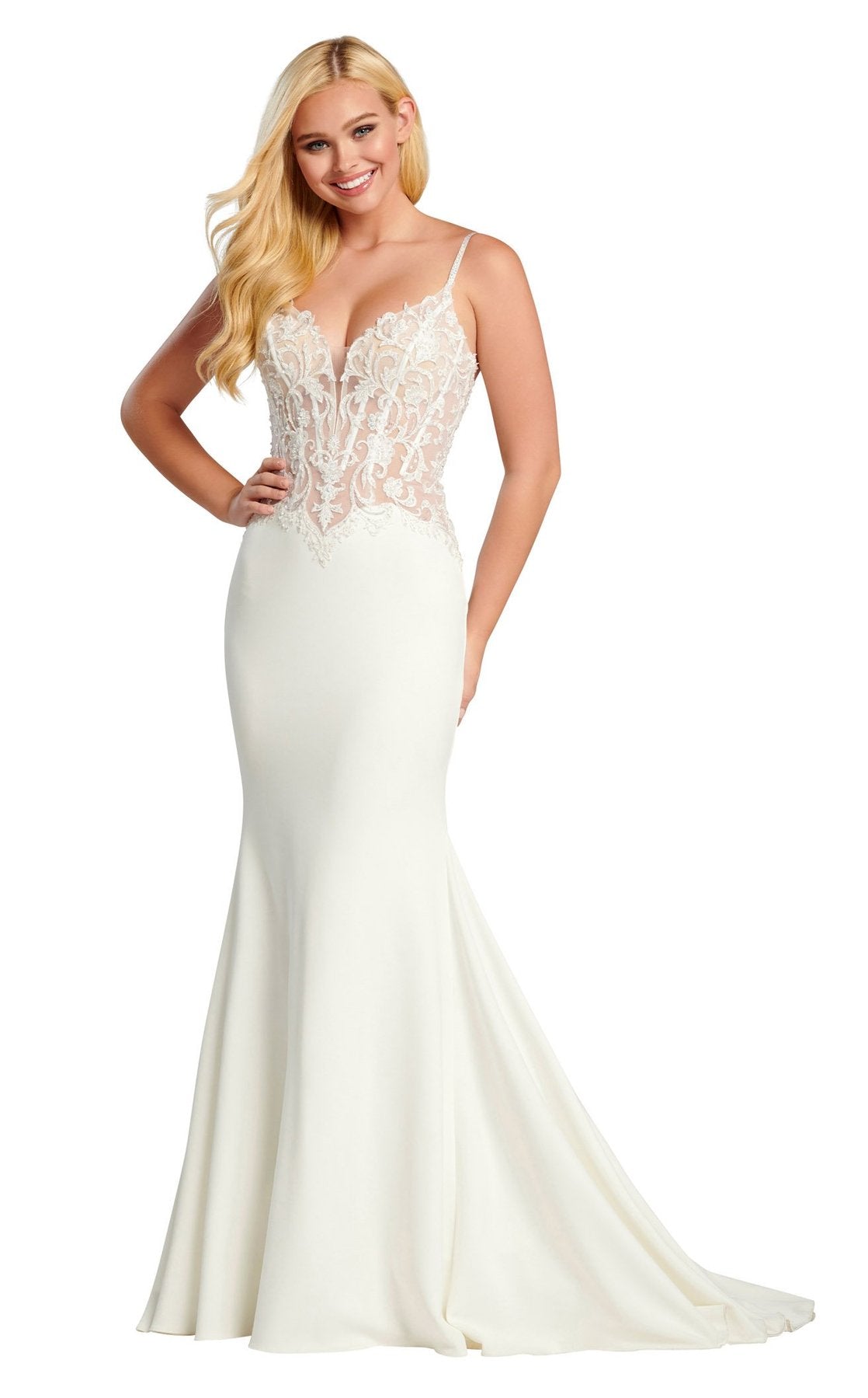 Ellie Wilde by Mon Cheri EW120084 Exquisite plunging V-neckline embellished prom dress designed by Ellie Wilde. Make your presence known when you walk into an event wearing this stunning piece from Ellie Wilde. Designed with lace appliques and embellished with sheeny beads, the fitted bodice features a plunging v-neckline supported by thin straps.