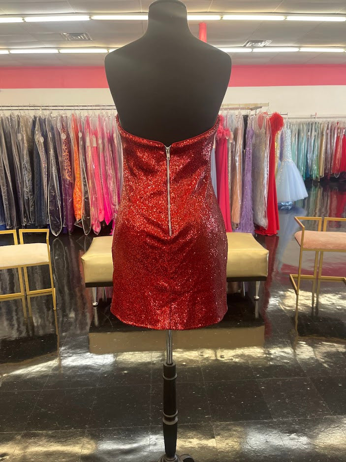 Ashley Lauren 4520 Neon Blue cocktail dress. This little dress is Strapless and has petite sequin fabric with a v neckline and peaks. It features a fitted skirt with exposed zipper back. Neon Green size 4