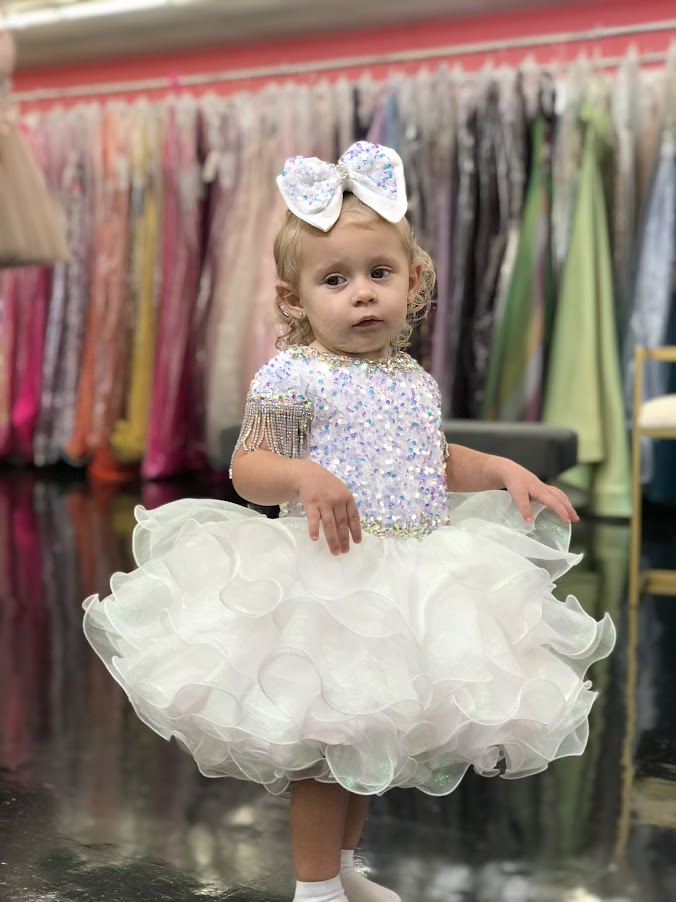 Sugar Kayne C203 Short Girls Cupcake Velvet Sequin Pageant Dress Crystal Fringe Tassel Cap Sleeve corset back Sizes: 0M, 6M, 12M, 18M, 24M, 2T, 3T, 4T, 5T, 6T Colors: Cotton Candy, Powder Blue, Unicorn