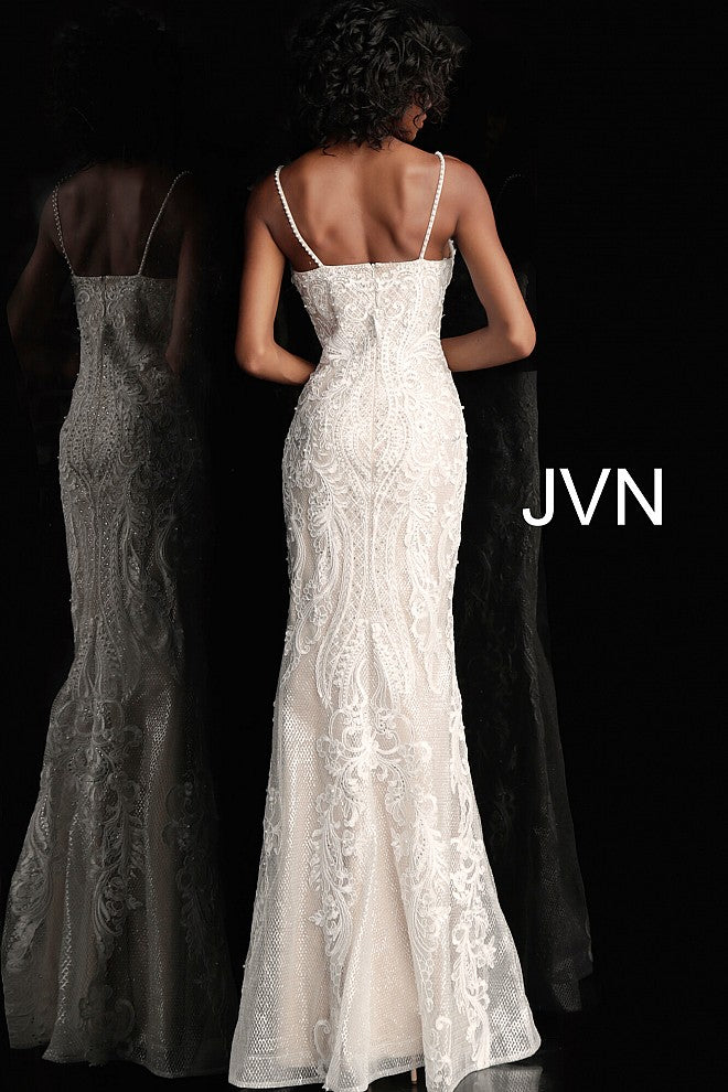 JVN65529 Ivory and nude embellished and embroidered prom dress with a v-neckline, spaghetti straps, sleeveless fitted bodice and straight back, floor-length fitted skirt with sheer overlay. Evening gown informal wedding dress.