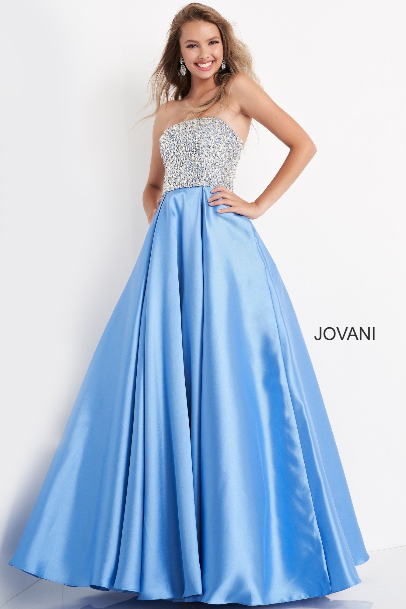 Jovani Kids k66689 is a Long Girls Party Dress, Kids Pageant Gown & Pre Teen Formal Evening Wear gown. This Girls Ballgown Features a Strapless straight neckline with a fitted bodice Embellished with Crystals & Rhinestones. A Line Pleated Ballgown Skirt - Floor Length. Great Girls Pageant Dress! Available Girls Sizes: 8, 10, 12, 14 Available Colors: lilac, pink, silver, sky-blue, white