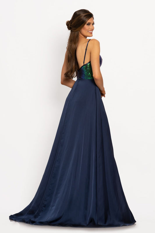 Johnathan Kayne 2214 Sequin bodice with a V neckline trimmed with charmeuse and spaghetti straps A line prom dress. The long charmeuse skirt on this pageant dress features a wrap style slit. Colors Berry, Navy, Teal Sizes 00, 0, 2, 4, 6, 8, 10, 12, 14, 16