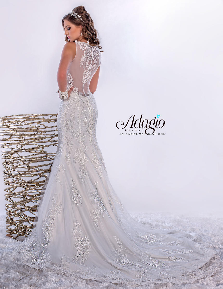 Adagio Bridal W 9274 is a gorgeous Floral Lace Embellished Fit & Flare Mermaid Silhouette wedding dress featuring a sheer plunging Illusion high neckline with a sheer embellished back. stunning train. Size 4 Color White