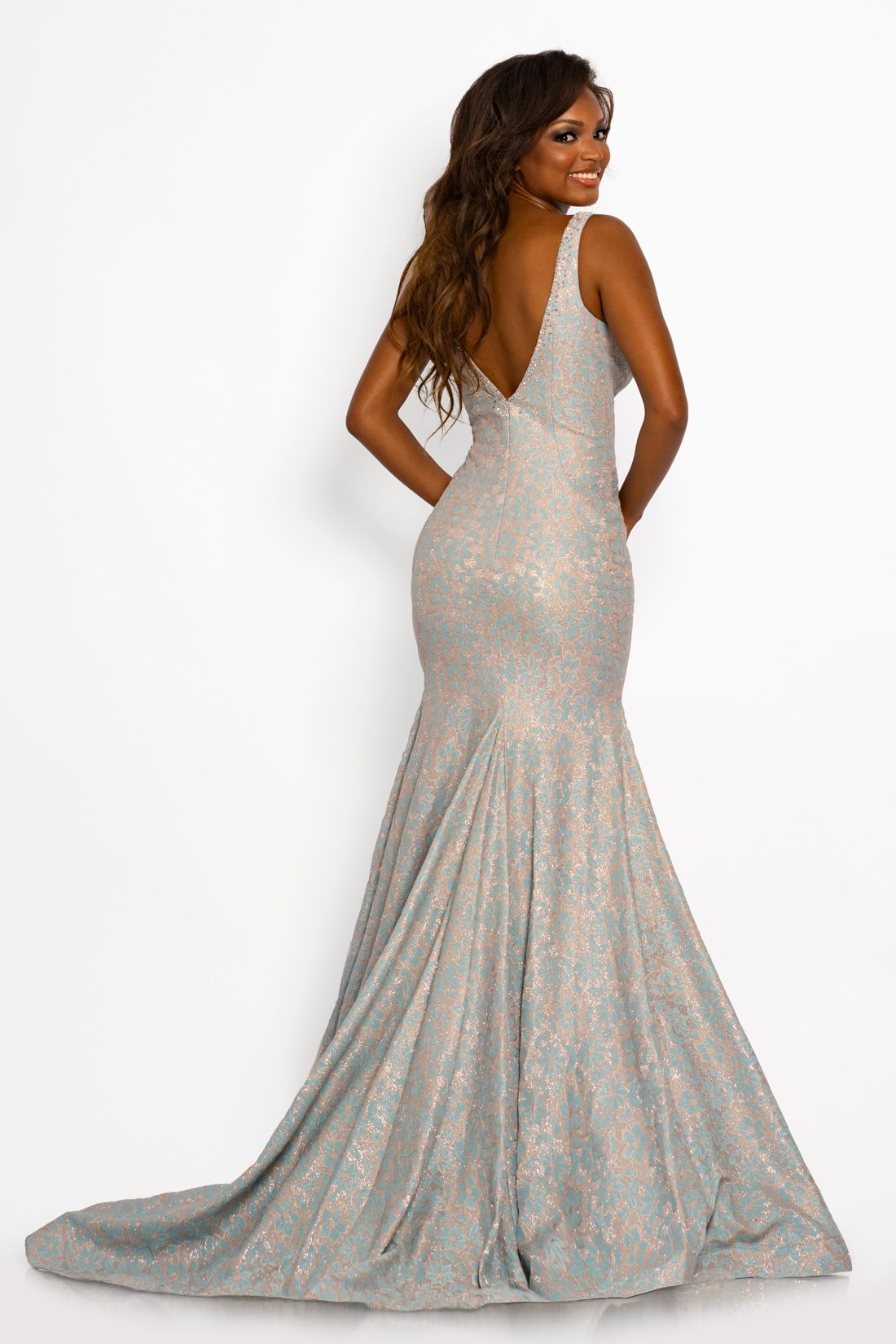 Johnathan Kayne 2259 This is a v neckline glitter lace mermaid prom dress with a v back and sweeping train. This evening gown has a floral lace pattern. Colors Navy, Sky Blue Sizes 00, 0, 2, 4, 6, 8, 10, 12, 14, 16