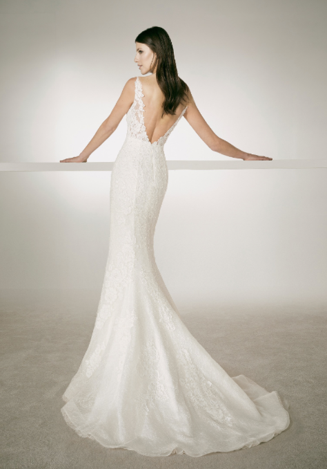 White One Bridal CHRIS is a long Lace Fitted Mermaid wedding Dress. Featuring a Plunging V neckline and sheer lace straps. IN STOCK FOR IMMEDIATE DELIVERY US SIZE 10 - OFF WHITE