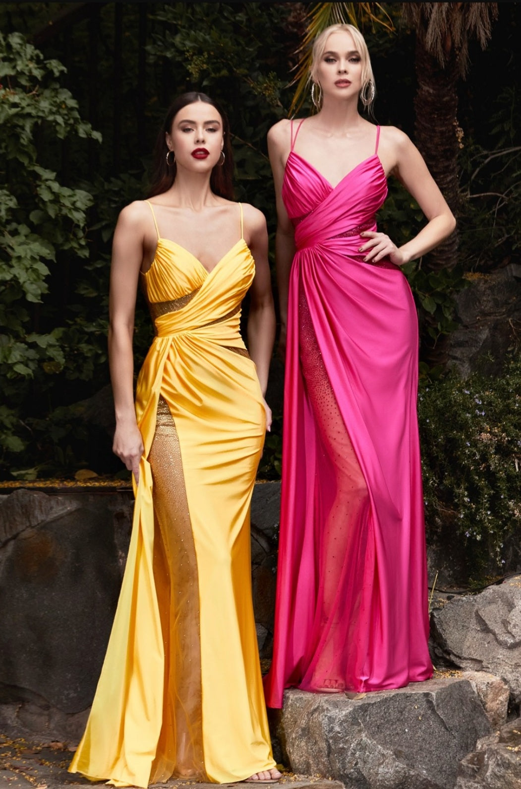 The elegance of the Ladivine CDS410 Long Fitted Teal Jersey Sheer Crystal Slit Overskirt prom dress Pageant Gown sets it apart, featuring a v-neckline gathered bodice with hot stone cut outs and leg slit, as well as a low open scoop back that sparkles in the light. Its ruched booty detail creates a standout silhouette. Sizes: 6 Colors: Teal