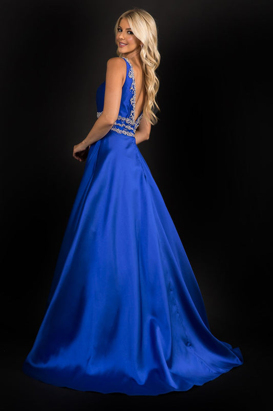 Nina Canacci 2290 Embellished plunging neckline A line prom dress embellished evening gown. Three rows of embellishments around the waistline. Colors: Baby Blue, Ivory, Royal Sizes: 8,10,12,14,16,18,20,22,24,