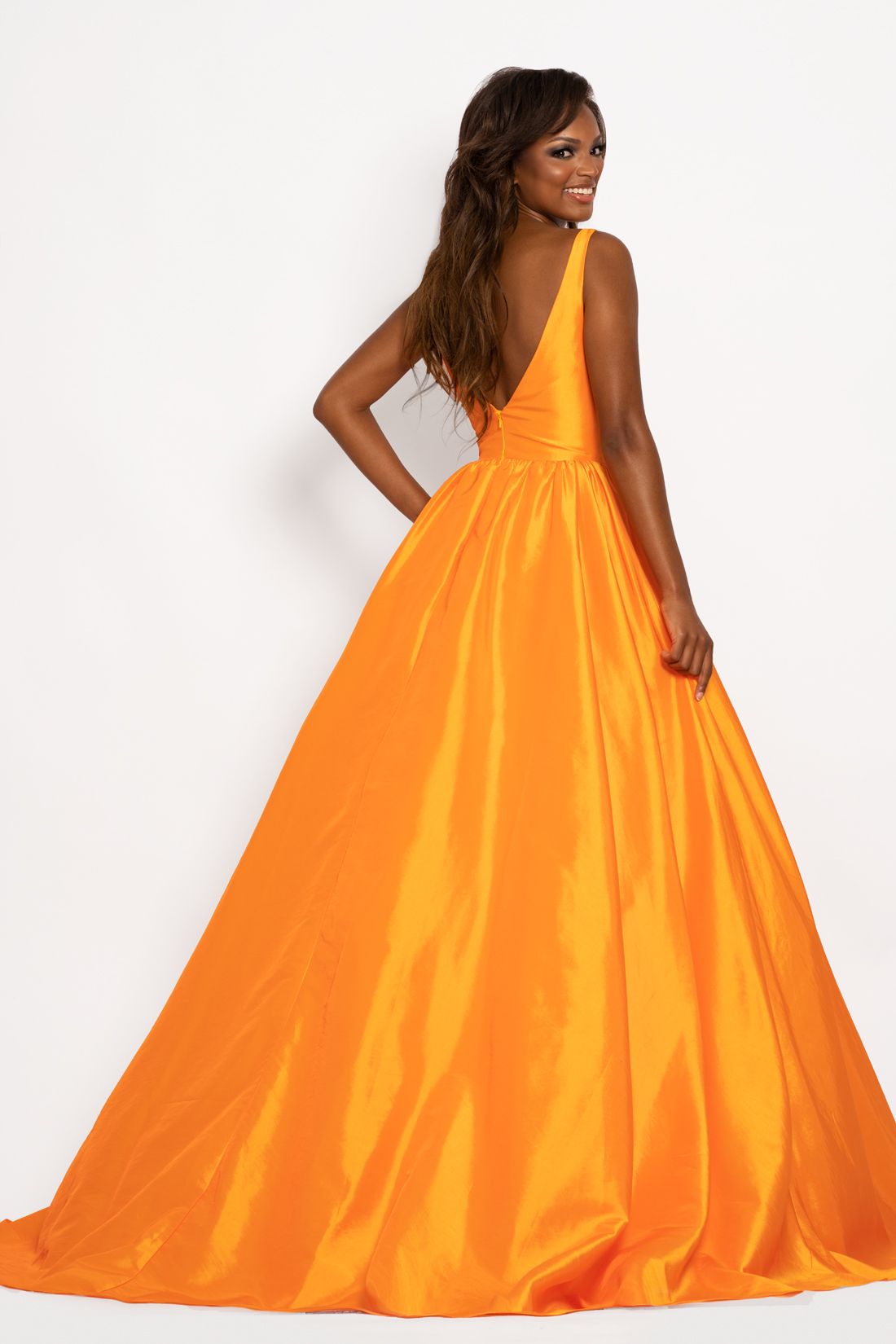 Johnathan Kayne 2225 Major Cinderella Vibes in this shimmery taffeta long A line prom dress. This pageant gown features a plunging sweetheart neckline with mesh panel and v back. Colors: Bubblegum, Mandarin Sizes 00, 0, 2, 4, 6, 8, 10, 12, 14, 16