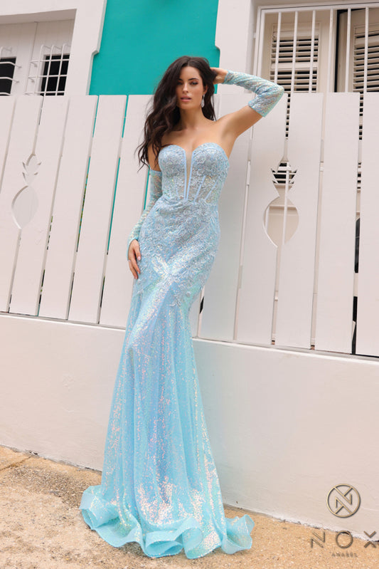 Expertly crafted with a flattering mermaid silhouette and intricate lace corset, the Nox Anabel D1263 Prom Dress will turn heads at any formal event. Featuring long sleeves and a stunning sequin design, this dress offers a unique and elegant option for your next special occasion.  Sizes: 00-16  Colors: Baby Pink, Black, Light Blue