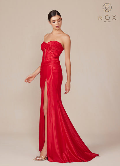 This Nox Anabel T1489 Satin Prom Dress features a fitted silhouette and a daring slit, perfect for a formal evening event. The cutout strapless corset bodice adds a touch of elegance and femininity. Made with high-quality satin, this gown will make you stand out with its sleek and sophisticated design.

Sizes: 00-16

Colors: Black, Gold, Plum, Deep Red, Ocean Blue