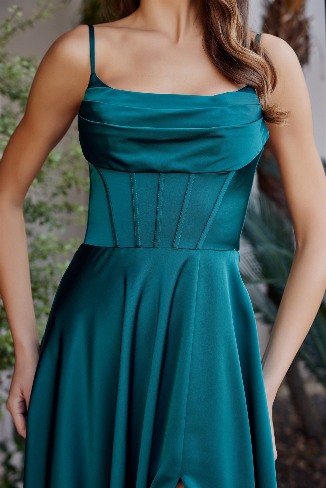Elevate your formal moment in this stunning Nox Anabel A1744 satin gown. Featuring a sculpted corset bodice that flatters and supports, a graceful train for dramatic impact, and a scoop neckline that balances elegance with allure. The strategic slit adds modern sophistication to this pageant-ready design. Perfect for prom, pageants, or any black-tie occasion where you want to make an unforgettable entrance. Crafted from luxurious satin for a refined, polished finish.

Sizes: 00-16


Colors: Black, Burgundy,