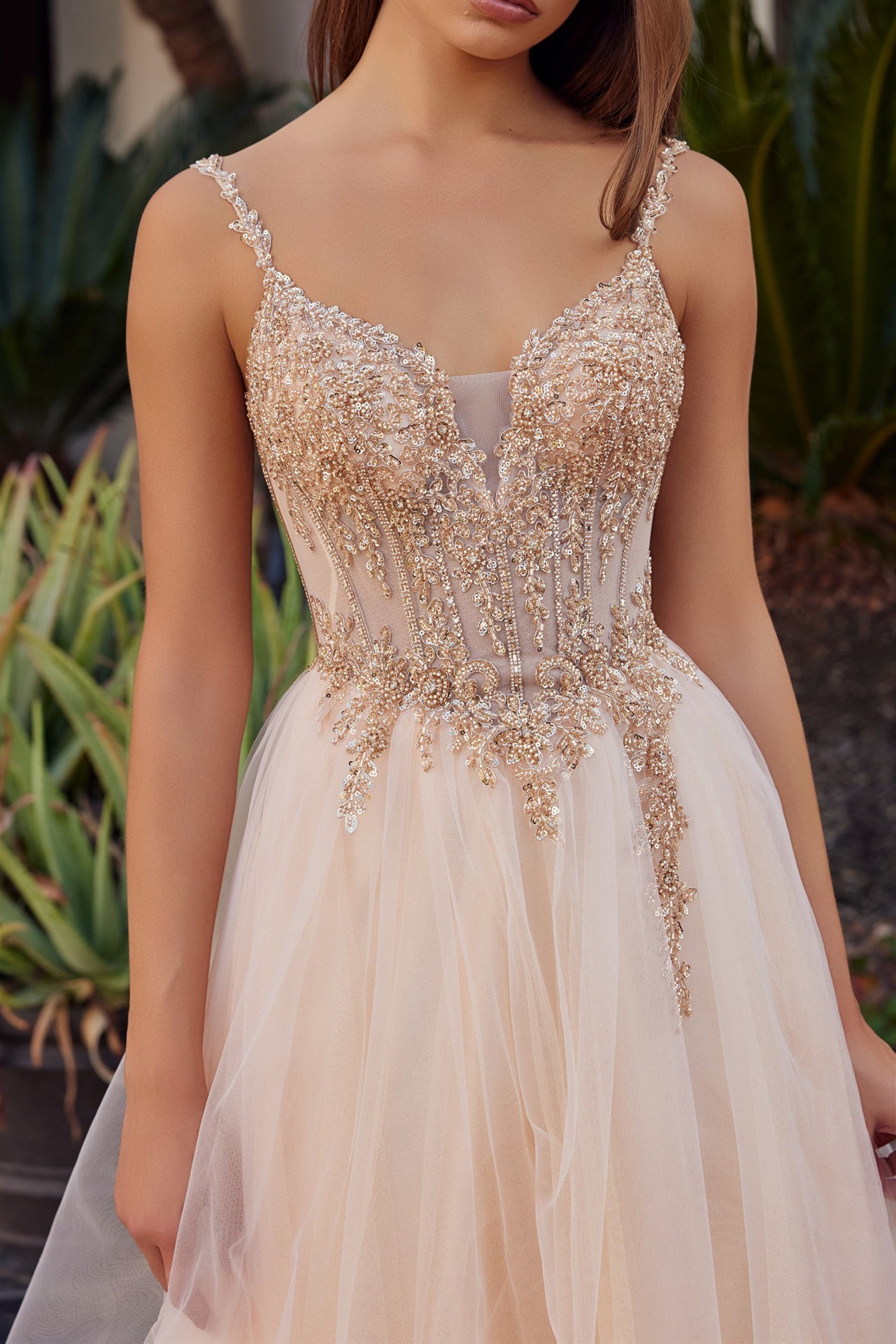 Make a statement in this Nox Anabel F1726 prom dress, featuring a sheer sequin corset bodice that catches the light with every movement. The structured A-line silhouette flatters your figure while the plunging V-neckline adds sophisticated allure. A graceful train completes the look with timeless elegance. Perfect for prom night or formal events where you want to feel confident and radiant.

Sizes: 00-16


Colors: Champagne, Greenery, Silver, Smoky Blue