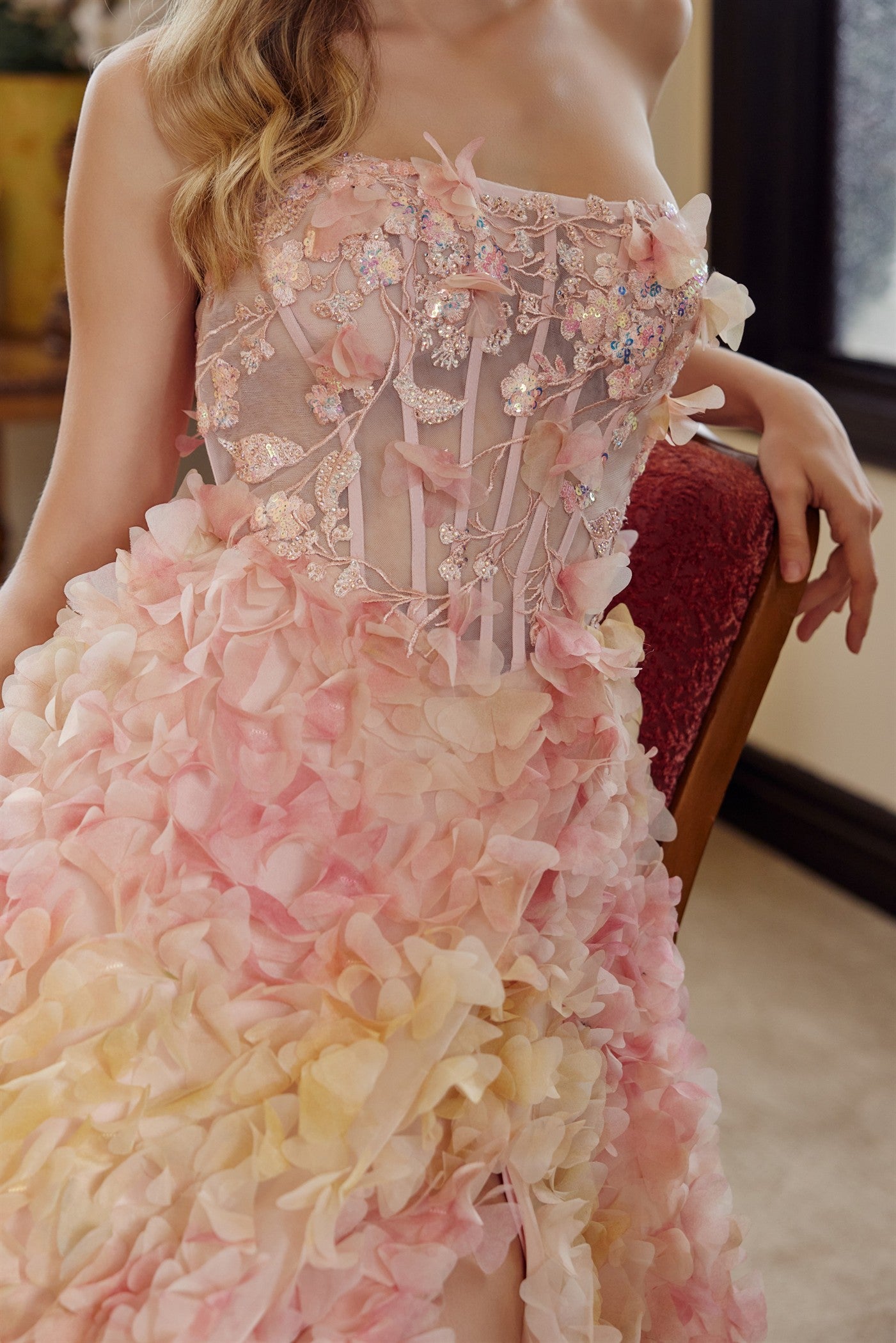 Elevate your prom night with the Nox Anabel G1790, a stunning strapless design featuring a sheer corset bodice adorned with intricate floral detailing. The straight neckline creates a sophisticated silhouette, while the dramatic slit train adds movement and elegance to every step. Crafted for the modern debutante, this gown combines timeless glamour with contemporary design, ensuring you make an unforgettable entrance.

Sizes: 00, 0, 2, 4, 8, 10, 12, 14

Colors: Yellow/Orange
