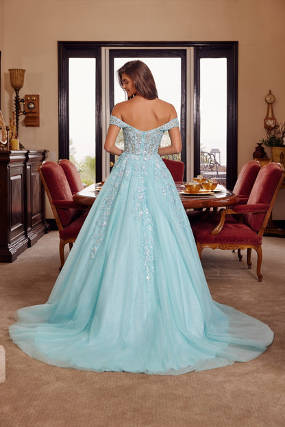 Nox Anabel's H1881 prom dress combines timeless elegance with contemporary allure. The off-the-shoulder silhouette frames the shoulders beautifully, while the sheer corset bodice creates a striking focal point with its plunging V-neckline. The flowing A-line skirt transitions into a graceful train, offering movement and drama on the dance floor. Crafted for those seeking a show-stopping entrance at prom or formal events, this dress balances sophistication with bold design details.

Sizes: 00-16

Colors: Aqu