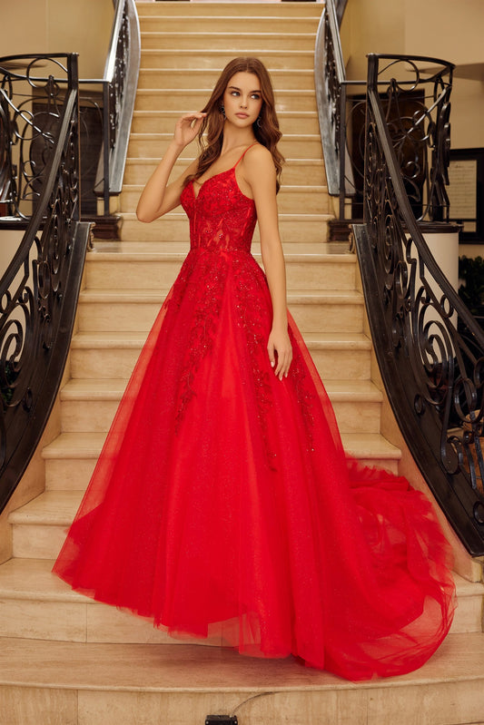 Elevate your prom night with the Nox Anabel H1883, a stunning A-line gown designed to turn heads. This sophisticated dress features a sheer corset bodice with a romantic sweetheart neckline and delicate spaghetti straps that frame the shoulders beautifully. The backless design adds an alluring touch of elegance, while the flowing A-line silhouette flatters every figure. A graceful train completes the look with timeless drama. Perfect for those seeking a balance of modern edge and classic prom glamour, this 
