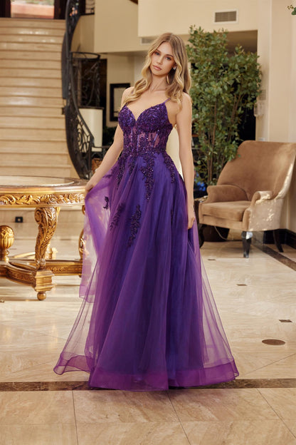 Make a statement in this stunning Nox Anabel Q1778 prom dress, designed for those who embrace bold elegance. The sheer beaded corset bodice creates a captivating silhouette with intricate detailing, while the sweetheart neckline flatters every frame. Delicate spaghetti straps provide graceful support, and the backless design adds an alluring touch of sophistication. A dramatic train completes the look, ensuring you'll turn heads all night long. Perfect for prom, formal events, or any occasion calling for sh