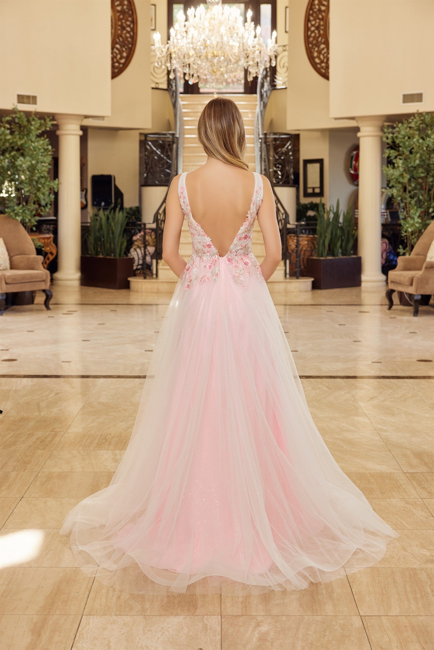 Elevate your prom night with this stunning Nox Anabel Y1799 gown, featuring a daring backless silhouette and plunging V-neckline that commands attention. The sheer floral corset bodice creates an intricate, romantic focal point, while the flowing skirt with dramatic slit offers movement and elegance. A graceful train adds timeless sophistication to this show-stopping design. Perfect for those seeking a bold, feminine statement piece that balances allure with refined glamour.

Sizes: 00-16

Colors: Baby Pink
