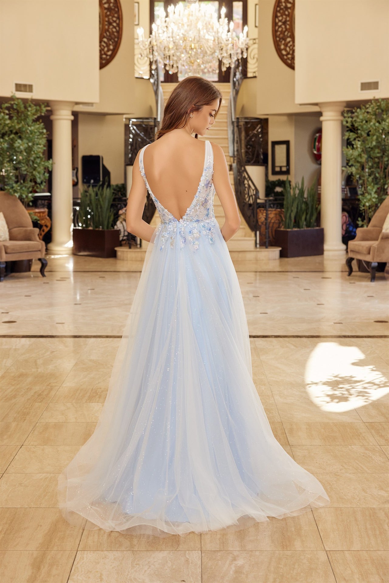 Elevate your prom night with this stunning Nox Anabel Y1799 gown, featuring a daring backless silhouette and plunging V-neckline that commands attention. The sheer floral corset bodice creates an intricate, romantic focal point, while the flowing skirt with dramatic slit offers movement and elegance. A graceful train adds timeless sophistication to this show-stopping design. Perfect for those seeking a bold, feminine statement piece that balances allure with refined glamour.

Sizes: 00-16

Colors: Baby Pink