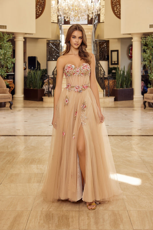 Make a statement in this stunning Nox Anabel Y1803 prom dress, designed for those who embrace bold elegance. The strapless silhouette features a sheer floral corset bodice that commands attention, while the dramatic slit and flowing train add movement and sophistication. The backless design creates an alluring, modern look perfect for prom night or formal events. Crafted with premium construction, this dress combines intricate detailing with flattering tailoring for an unforgettable entrance.

Sizes: 00-16
