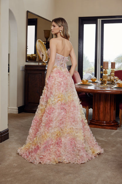 Elevate your prom night with the Nox Anabel G1790, a stunning strapless design featuring a sheer corset bodice adorned with intricate floral detailing. The straight neckline creates a sophisticated silhouette, while the dramatic slit train adds movement and elegance to every step. Crafted for the modern debutante, this gown combines timeless glamour with contemporary design, ensuring you make an unforgettable entrance.

Sizes: 00, 0, 2, 4, 8, 10, 12, 14

Colors: Yellow/Orange