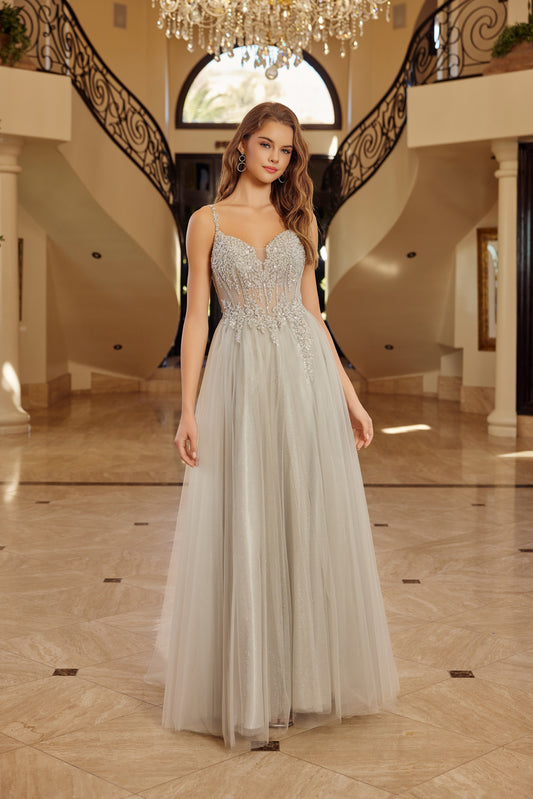Make a statement in this Nox Anabel F1726 prom dress, featuring a sheer sequin corset bodice that catches the light with every movement. The structured A-line silhouette flatters your figure while the plunging V-neckline adds sophisticated allure. A graceful train completes the look with timeless elegance. Perfect for prom night or formal events where you want to feel confident and radiant.

Sizes: 00-16


Colors: Champagne, Greenery, Silver, Smoky Blue