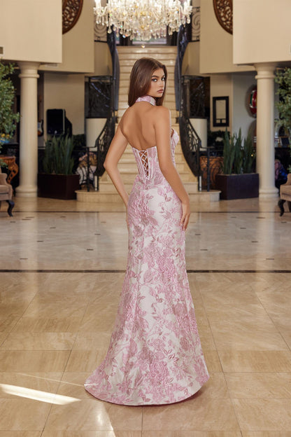 Nox Anabel's T1922 delivers editorial elegance for the modern prom-goer. This strapless sheath silhouette features a structured corset bodice that sculpts and supports, while the dramatic low back and choker train create an unforgettable entrance. The clean lines and refined construction make this dress equally at home on the red carpet or at formal events. A timeless investment piece for those who favor understated luxury and architectural design.

Sizes: 00-16

Colors: Blue, Pink