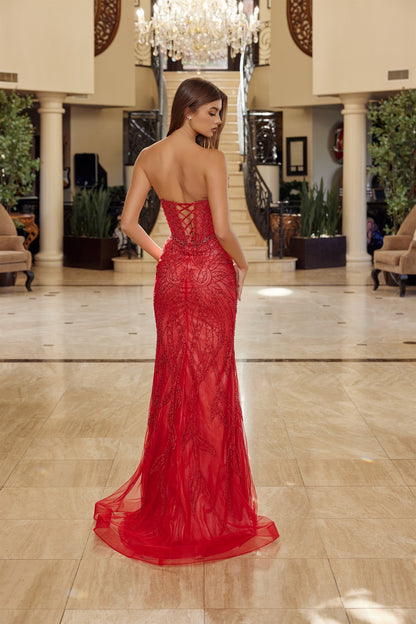 Nox Anabel's C1848 is a show-stopping prom dress designed for those who embrace dramatic elegance. The sweetheart neckline frames the shoulders beautifully, while intricate beading adorns the fitted corset bodice for a refined, structured silhouette. Strategic cutout details add modern sophistication, and the strapless design keeps the focus on the exquisite beadwork. A graceful low back and flowing train complete the look—perfect for making an unforgettable entrance at prom or formal events.

Sizes: 00-16
