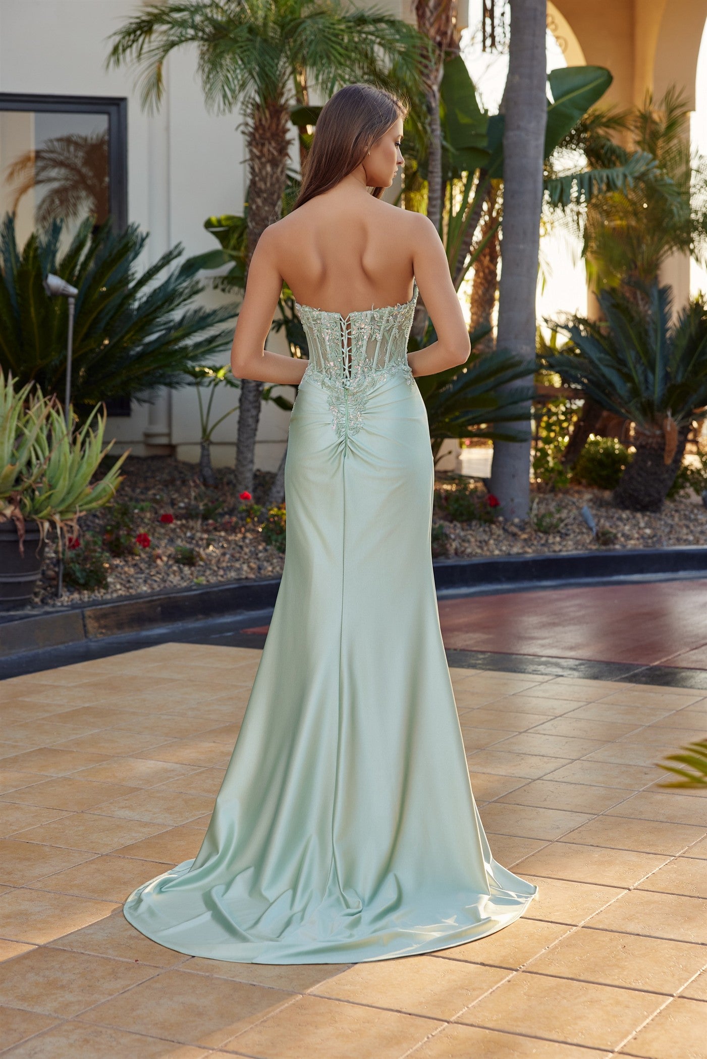 Elevate your prom night with the Nox Anabel R1811, a stunning strapless gown that commands attention. This sheer beaded corset bodice features intricate detailing that catches the light with every movement, while the sweetheart neckline flatters and frames beautifully. The low back design adds modern sophistication, and the dramatic slit train creates an elegant silhouette as you walk. Perfect for those seeking a show-stopping moment on the dance floor.

Sizes: 00-16

Colors: Mocha Gold, Sage Green
