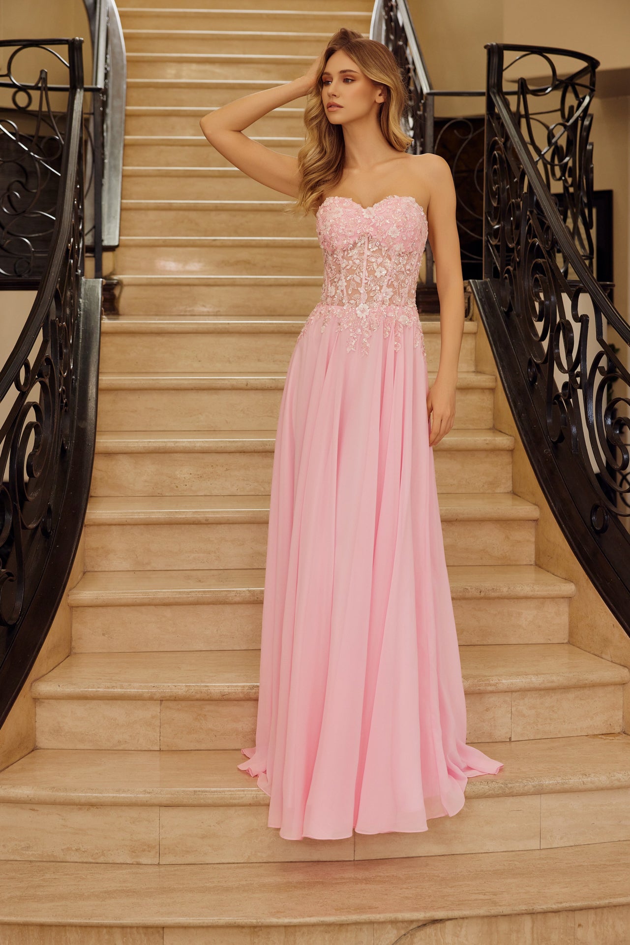 Nox Anabel's C1617 prom dress combines timeless elegance with modern glamour. The sheer sequin and beaded corset bodice creates a striking focal point, while the sweetheart neckline and strapless design offer a romantic silhouette. The A-line skirt provides graceful movement and flattering proportions. A daring backless cut adds contemporary edge to this show-stopping gown, perfect for prom, formal events, or special occasions where you want to make an unforgettable entrance.

Sizes: 00-16

Colors: Lemon, P