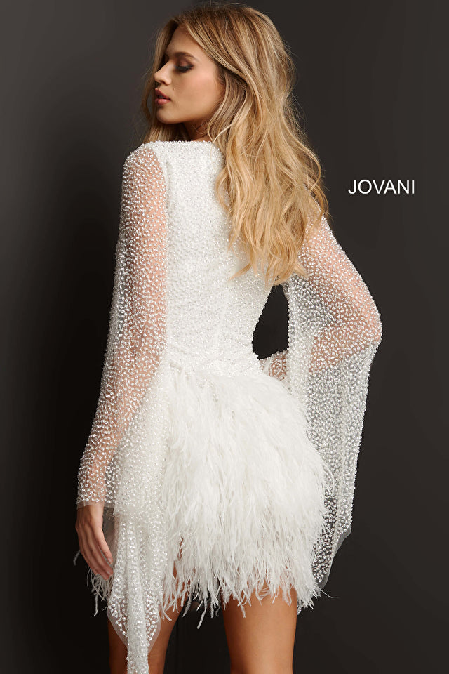 Jovani 07236 Off White Beaded Long Kimono Sleeve Feather Skirt V-Neck Short Cocktail Homecoming Dress. This showstopper dress from Jovani features luxurious beading, a feather skirt, long sleeves, and a flattering V-neck. Perfect for any special event, the delicate off-white hue will make you stand out from the crowd.