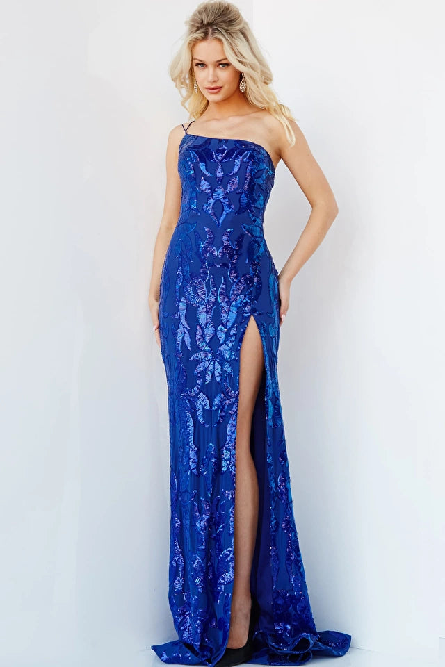 Get ready to steal the show with Jovani's 07913 Royal Sequin High Slit Prom Dress. This stunning piece features a unique blend of style and comfort, making you the center of attention on any special occasion. The dress is made from a stretchy, form-fitting fabric that hugs your curves in all the right places. The sequin floral design adds a touch of glamour and sparkle to the dress, while the high slit and open tie-back bodice add a touch of sexiness.