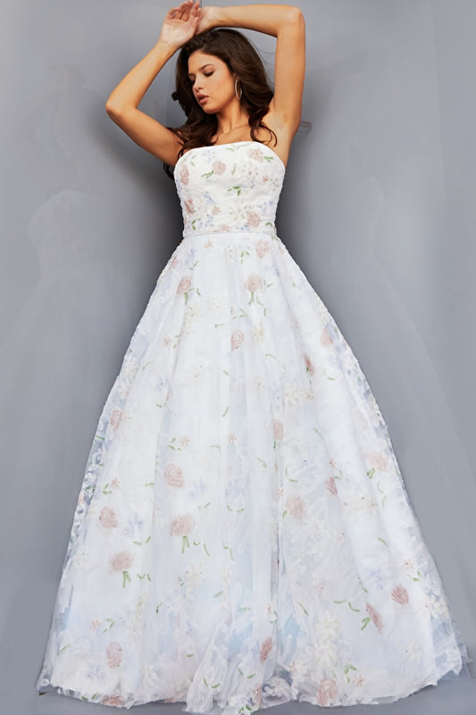 This stunning Jovani prom dress features a strapless sweetheart neckline, intricate floral detailing, and a corset lace-up bodice. Crafted with the highest quality materials, this elegant off white dress ensures the perfect fit and luxurious feel. Look ravishing in this beautiful floor length dress!