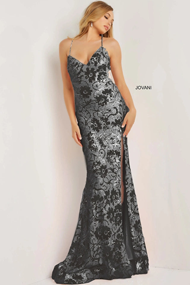 Jovani 08255 Sexy Floral Embellished Low Tie Back Sheath Prom Pageant Gown dress. The Jovani 08255 gown features a sexy low-back with a tie, a sheath silhouette and a floral embellishment to add sparkle and glam. The beautiful design is perfect for prom and pageants.