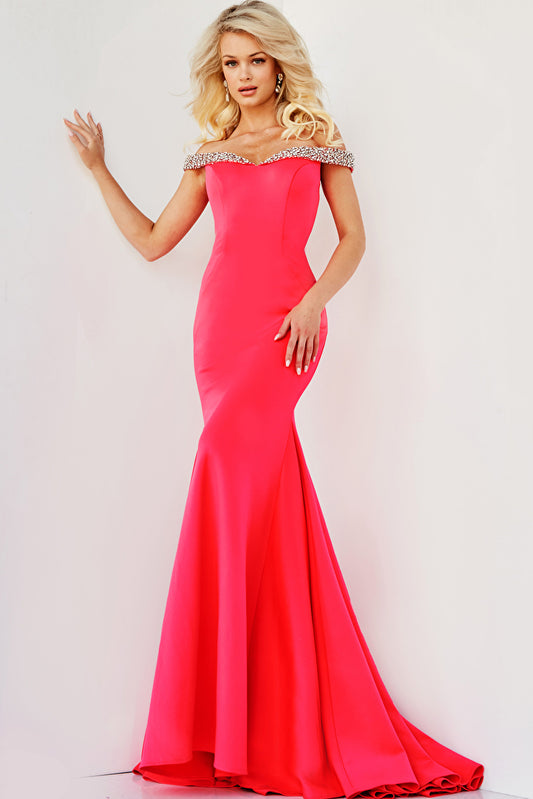 Expertly crafted from stretch fabric, this Jovani prom dress style JVN08436 is a stunning choice for any formal event. The fitted bodice features a semi sweetheart neckline with off-the-shoulder crystal embellishments, adding a touch of sparkle. The mermaid bottom and sweeping train accentuate your figure and create an elegant silhouette. Step out in style with this glamorous evening gown.  Sizes: 00-24  Colors: Cerise, Coral, Cobalt, Fuchsia, Periwinkle