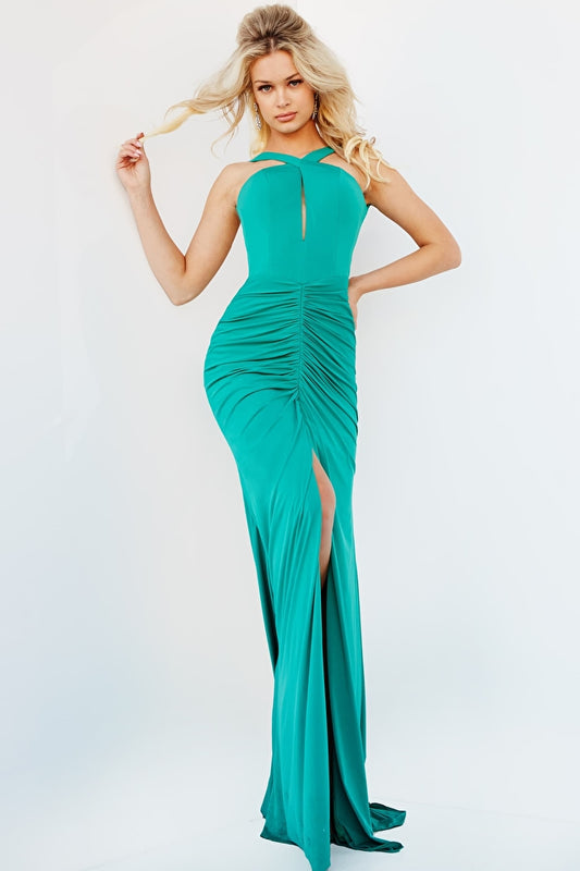 Jovani 08651 Stretch Jersey Front Ruching Floor Length Skirt Backless Bodice With Criss Cross Key-Hole Neckline Dress. Discover elegance and timeless style in the Jovani 08651 dress. Crafted from stretch jersey, this dress flaunts a backless bodice with criss cross key-hole neckline, and a floor length skirt with front ruching. Make a lasting impression with this sophisticated and versatile piece