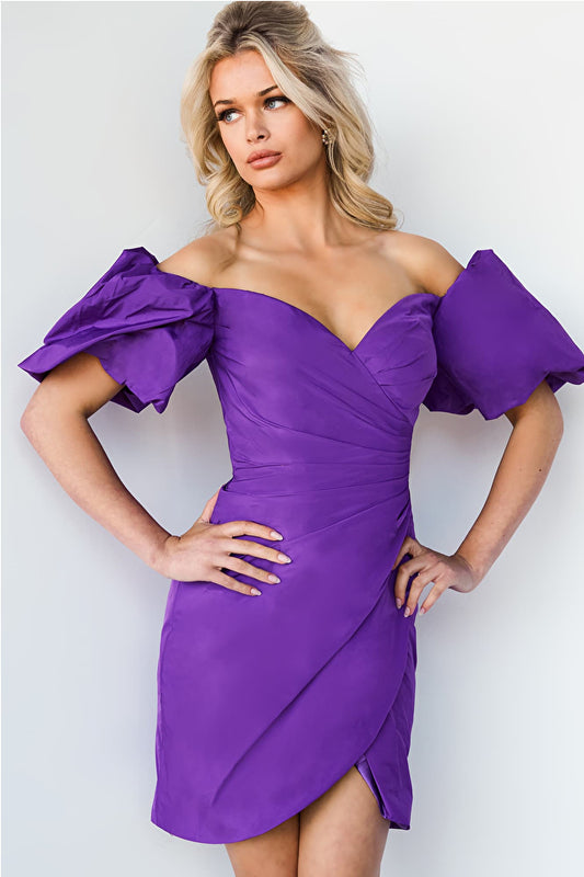 Jovani 09476 Off The Shoulder Puff Sleeve Ruched Wrapped Skirt Sweetheart Neckline Homecoming Dress. The Jovani 09476 Homecoming Dress is the perfect choice for your upcoming event. This dress features an off-the-shoulder neckline, puff sleeves, and a sweetheart neckline. The ruched skirt is wrapped around the waist and finished off with a wrap-style skirt to complete the look. Crafted from lightweight material, it's sure to make you feel comfortable and look amazing.